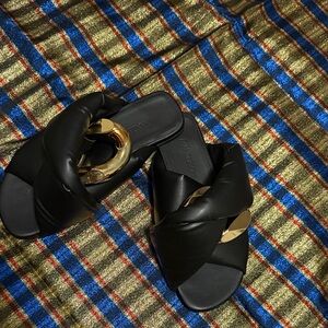 JW ANDERSON Black Mules with Gold Accent